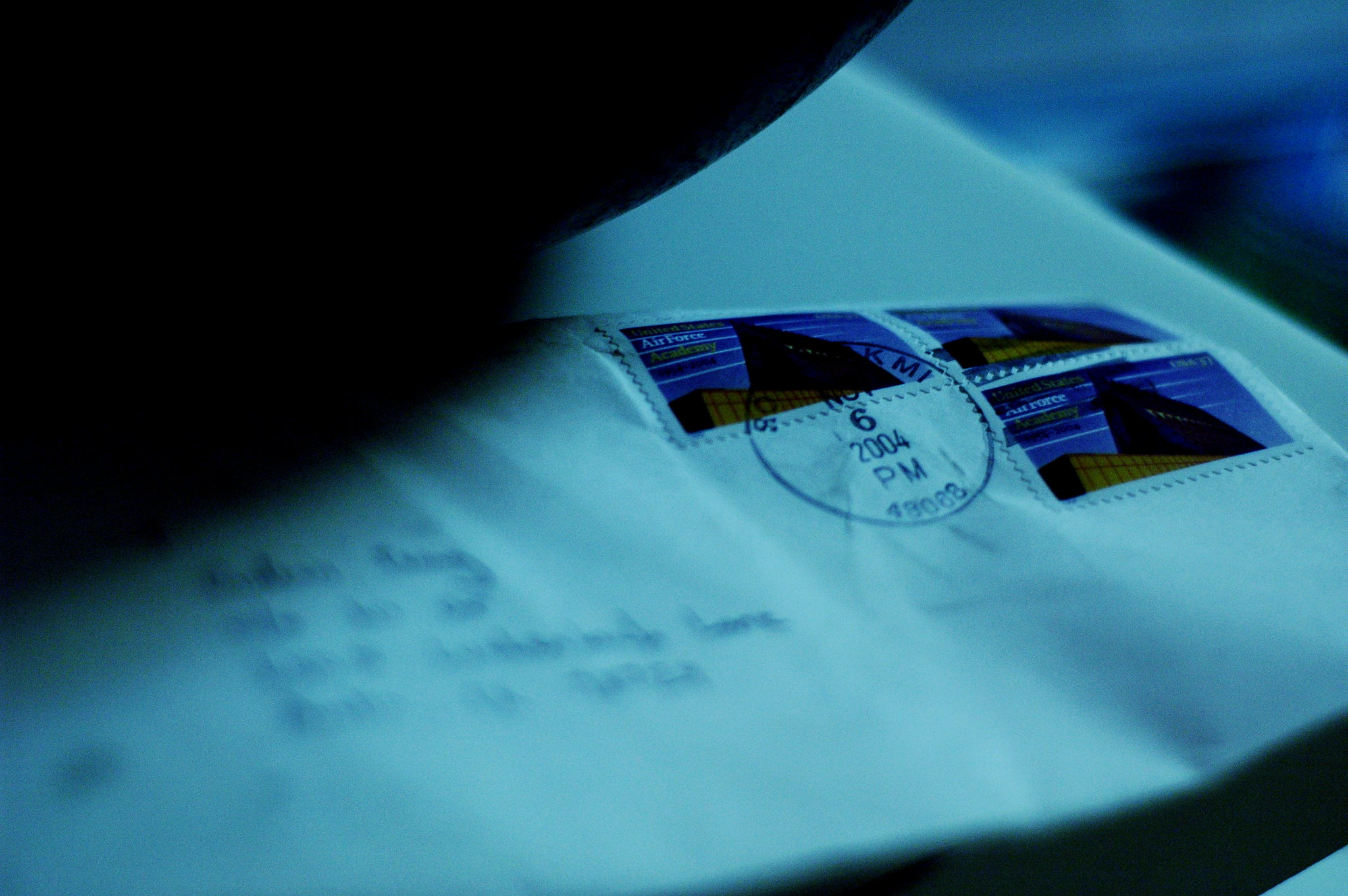 Photo of a sealed envelope with a blurred out address