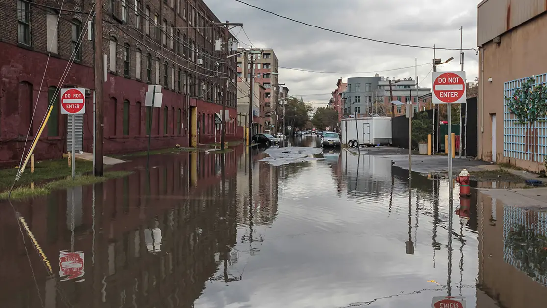 Photo of a flooded city street after a hurricane. Photo by Adobe Stock.